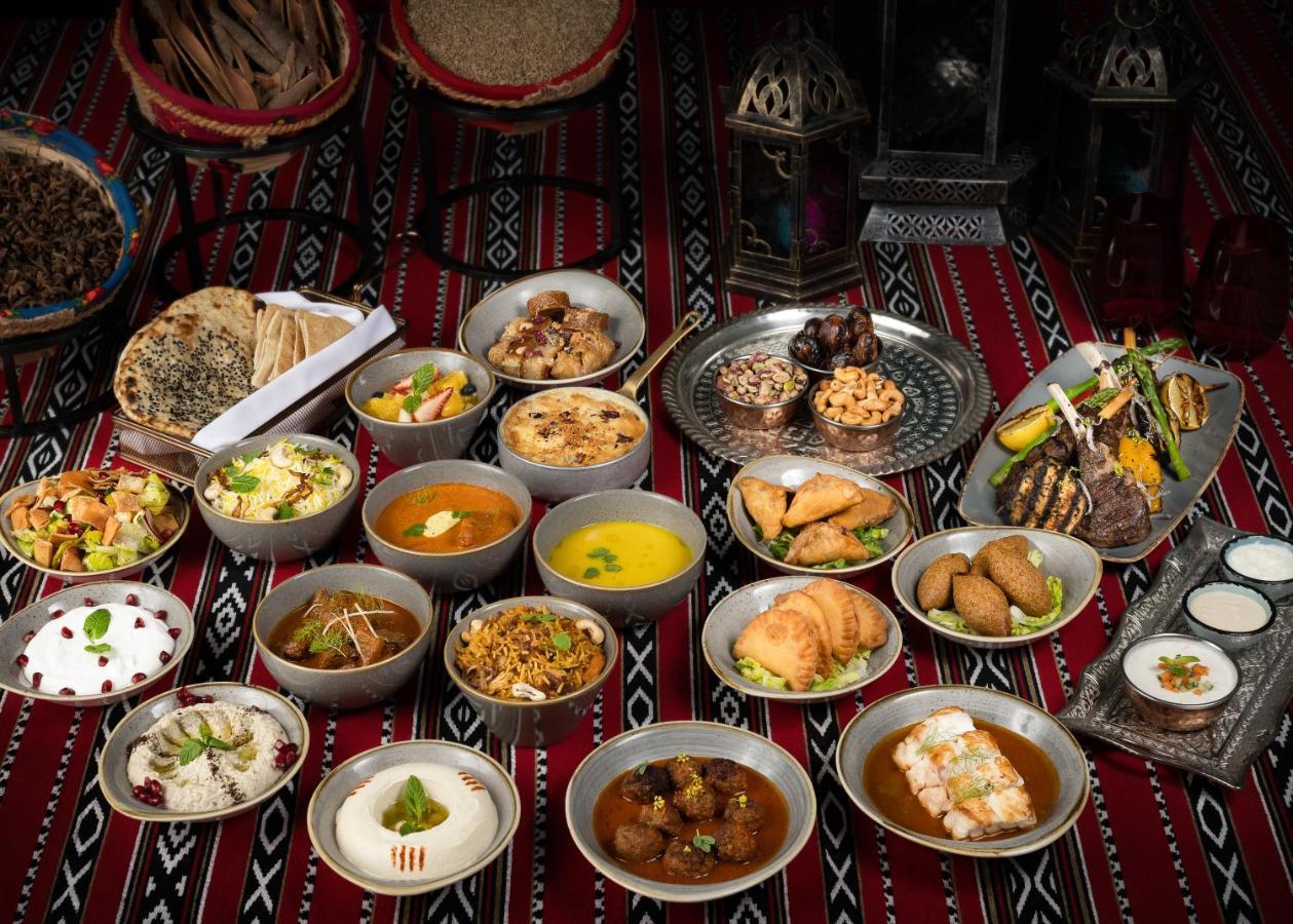 Centara West Bay Hotel & Residences Doha Kültér fotó A selection of traditional Emirati cuisine