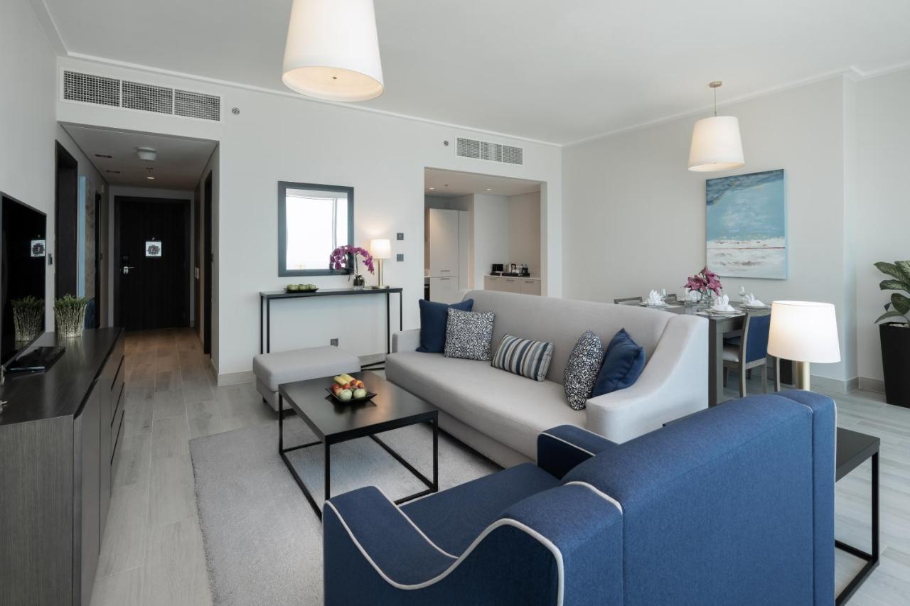 Centara West Bay Hotel & Residences Doha Kültér fotó A living room at the Address Downtown Hotel