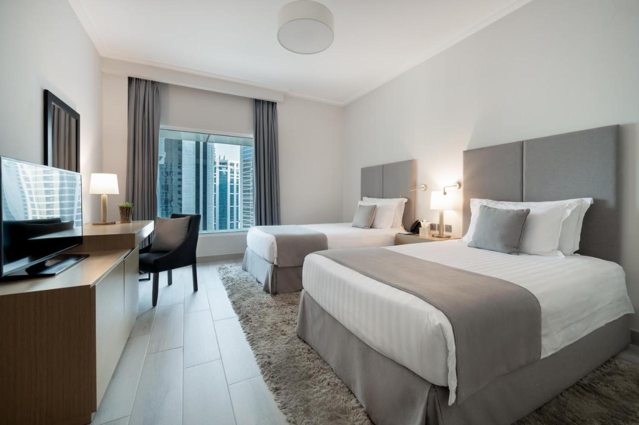 Centara West Bay Hotel & Residences Doha Kültér fotó A typical guest room at the hotel