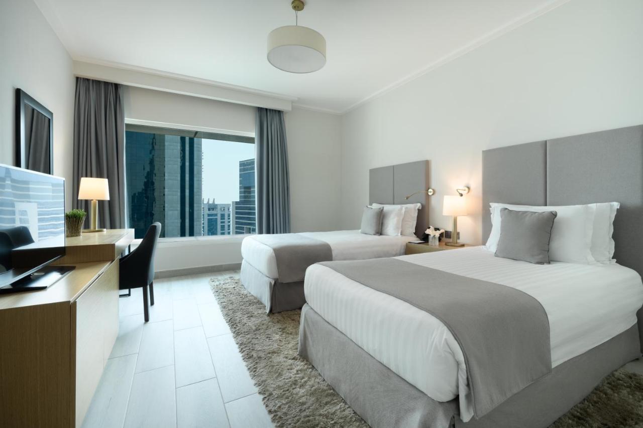 Centara West Bay Hotel & Residences Doha Kültér fotó A guest room at the hotel