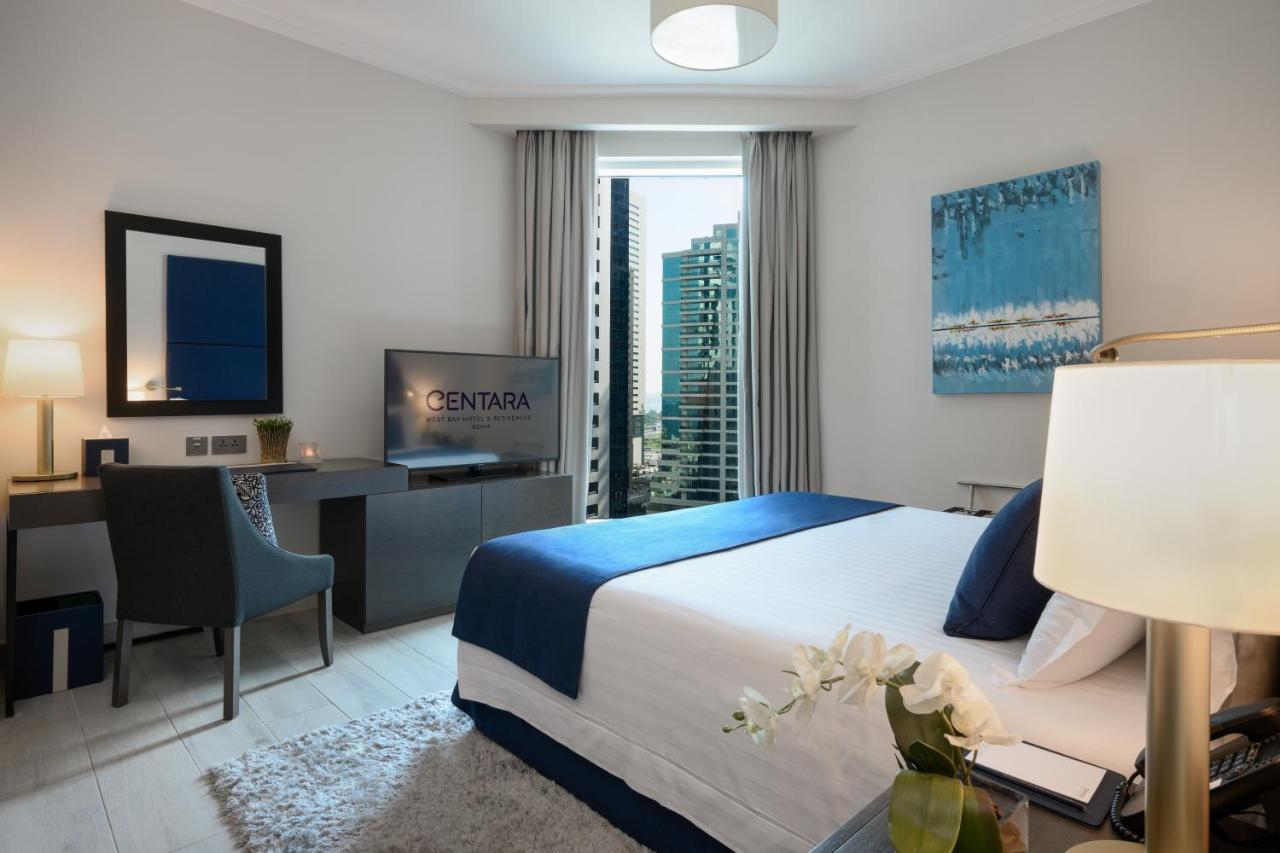 Centara West Bay Hotel & Residences Doha Kültér fotó A bedroom at the hotel
